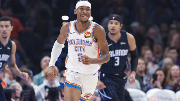 Jan 13, 2024; Oklahoma City, Oklahoma, USA; Oklahoma City Thunder guard Shai Gilgeous-Alexander (2) smiles after scoring against the Orlando Magic during the first quarter at Paycom Center.